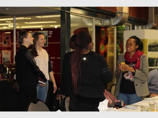 Attendees at the launch held at the Adler Museum of Medicine at Wits Medical School talk about the new information on obesity in South Africa.