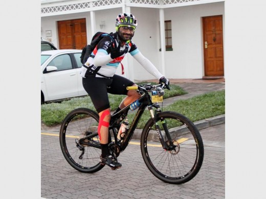 Linden’s Alexis Mechanicos gives a wave to the camera as he sets off from the King George Hotel in George in this year’s TransCape MTB Race. Photo supplied.