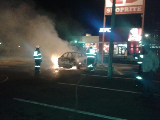The driver drove his car to a nearby Shoprite supermarket after it caught fire. Photo supplied.