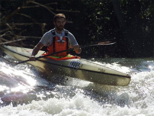 Peter van Biljon paddles through the rapids at the recent BASF river race. Photo supplied.