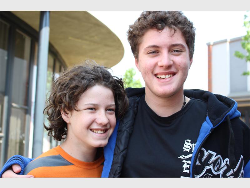 Tristan Smyth (left) is glad to be back with his family and his brother, Quintin (right), after surviving being alone for 22 hours in the Magaliesberg Mountains.