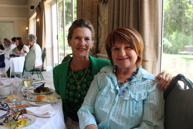 Koekoes Cordier and Renee van Wyngaard enjoy lunch at the Christmas party.