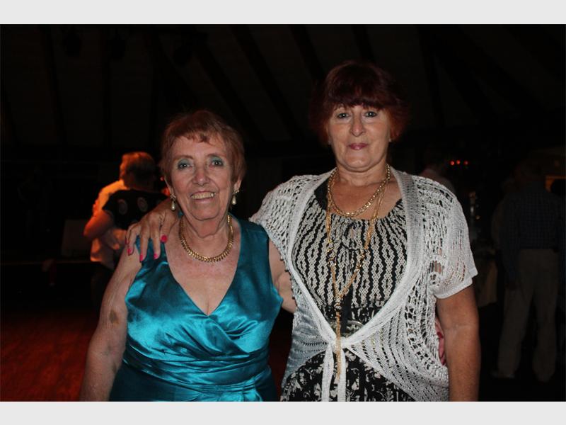 Carol Driessen and Cynthia Sinclair dress up for a night of fun.