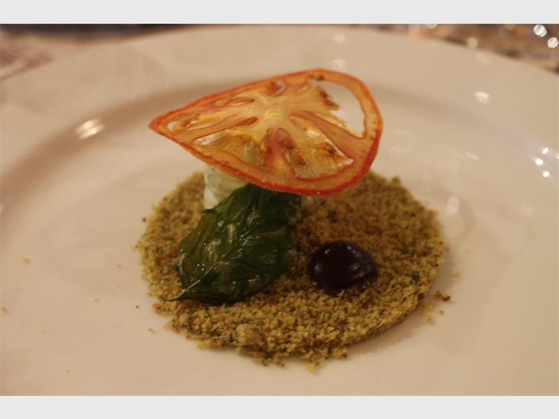 Guests were served a starter of basil mousse, dehydrated tomato, deep fried basil and balsamic gel.