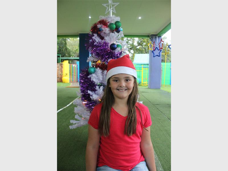 Leah Burgers: I love spending time with my family and I think Father Christmas is fat with a long white beard and he wears a red suit with boots and glasses. For Christmas I asked for Elf Lego. I love them because they are fun and there are dragons.