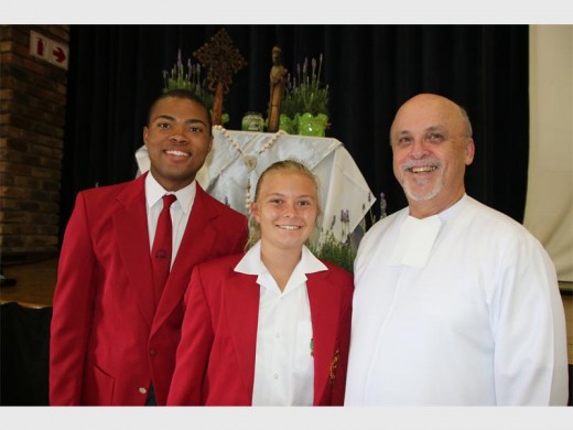 Head boy and Girl, Philani Mpofu and Deena Martin, were very appreciative to have Brother Robert Schieler there to see them receive their red blazers. Photo: Supplied.