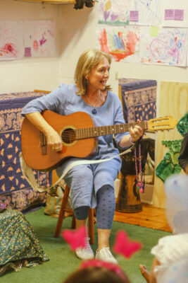 Diane Cowen plays the guitar