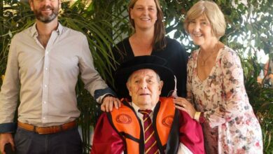 Carol Jefferey as they flank their family's newest graduate