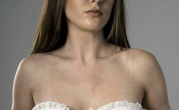 Cailin Brown in a sheer bustier top.