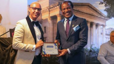 Deputy principal of Greenside High School Craig Strauss with Professor Zeblon Vilakazi.