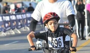 Zayn Cajee on his assisted bicycle