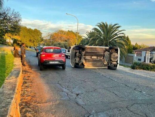 An overturned vehicle along Senior Drive in Northcliff.