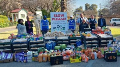 Let's Work: Last year for Mandela Day, the group collected and distributed food to the needy in the area.