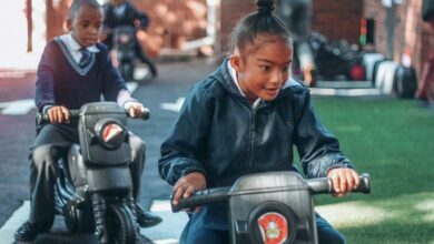 Children of Sparrow Foundation School ride on their scooters. Photo: Neo Phashe