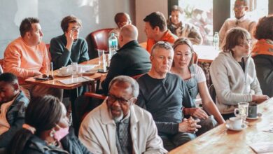 Music lovers enjoy some coffee.