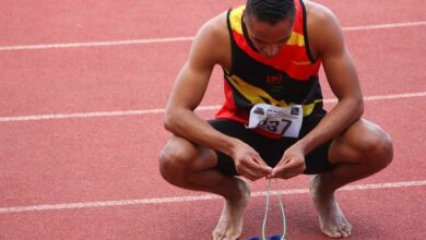 Lythe Pillay gets his shoes ready for a race.