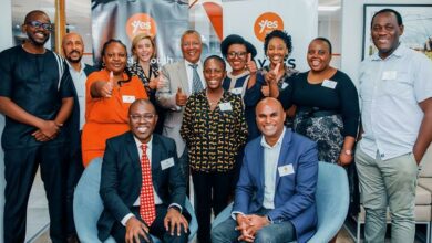 The UJ and YES teams gather at the ceremony.