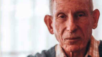 Selwyn Klass with the framed invitation he received to be part of the reception of Queen Elizabeth II's state visit to South Africa which was held in Newtown. Photo: Neo Phashe