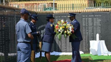 Gauteng provincial commissioner Lieutenant General Elias Mawela lays the first wreath. Photo: Emily Wellman Bain