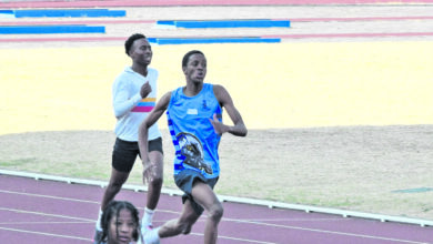 Itumeleng Seema leads in the U17 boys’ 400m. Photo: Emily Wellman Bain