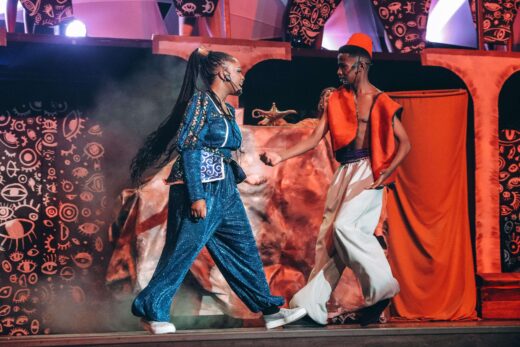 Kone Modiba (Genie) and Larona Sedumedi (Aladdin) have a scene in the Cave of Wonders