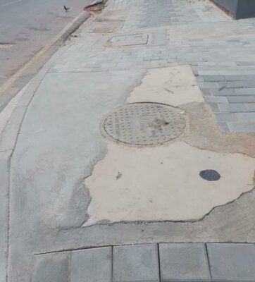 This item will go onto the snag list upon practical completion of the project and the edges, paving and cracks will be neatened up where possible.