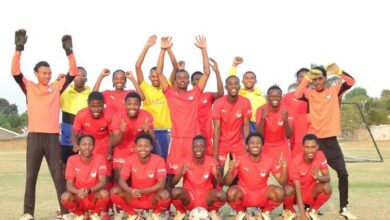 The Growing Campions soccer team are ecstatic after winning the league.
