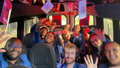 All smiles as learners pose for a photo with 5Fm breakfast host Dan Corder.