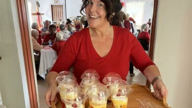 Alison Hall delivering some delicious deserts to the hall.