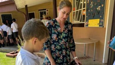 Liam Liebenberg in Grade 3 with Kirsty Turner, learning support therapist, learning compound words by rotating the boxes to find different combinations.