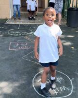 Tuelo Motsepe Grade 0 - playing language hopscotch learning his colours in different languages.