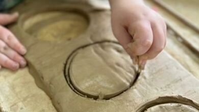 Small circles are made in the clay.