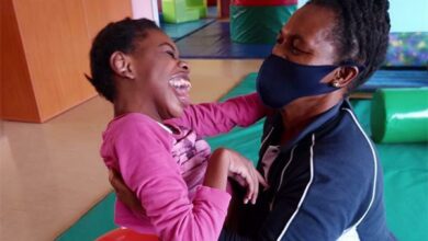 Physiotherapy assistant Monica Mazibuko and Natasha Moyo, a resident.