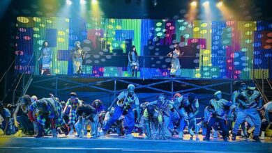 The cast of Footloose on stage.