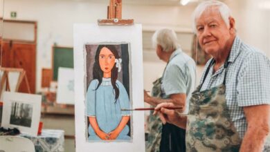 Rod Lambert with a painting he drew that was inspired by Italian painter, Amedeo Modigliani. Photo: Neo Phashe