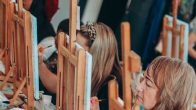 Guests concentrate on painting their owls. Photo: Neo Phashe