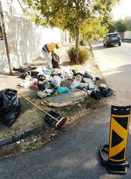 The aftermath following the Pikitup strike left waste piled up on the streets in Melville.