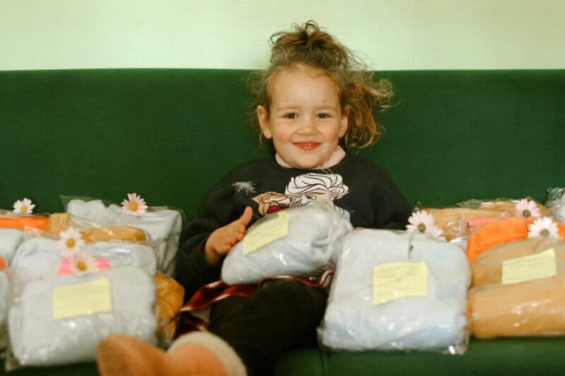Through a non-profit organisation run by her mother, Emily Strydom headed to Princess Alice Adoption Home in Westcliff, and handed over donated, handmade hoodies to babies in need.