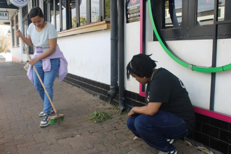 A group of volunteers from SIX Cocktail Bar spent their day cleaning up in front of shops and restaurants, doing their bit for Mandela Day.