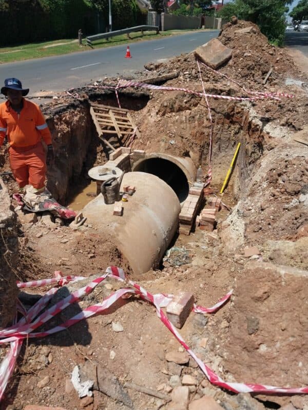 The scope of the repairs include excavation, pipe repair, back-filling, and resurfacing of the road.