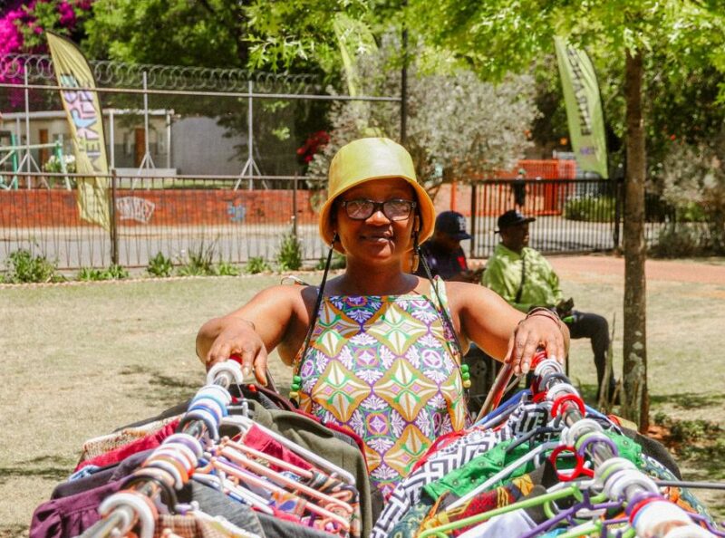 Tshepo Mdhluli with her sourced garments at the Melville Market on October 25, 2025. Photo: Neo Phashe