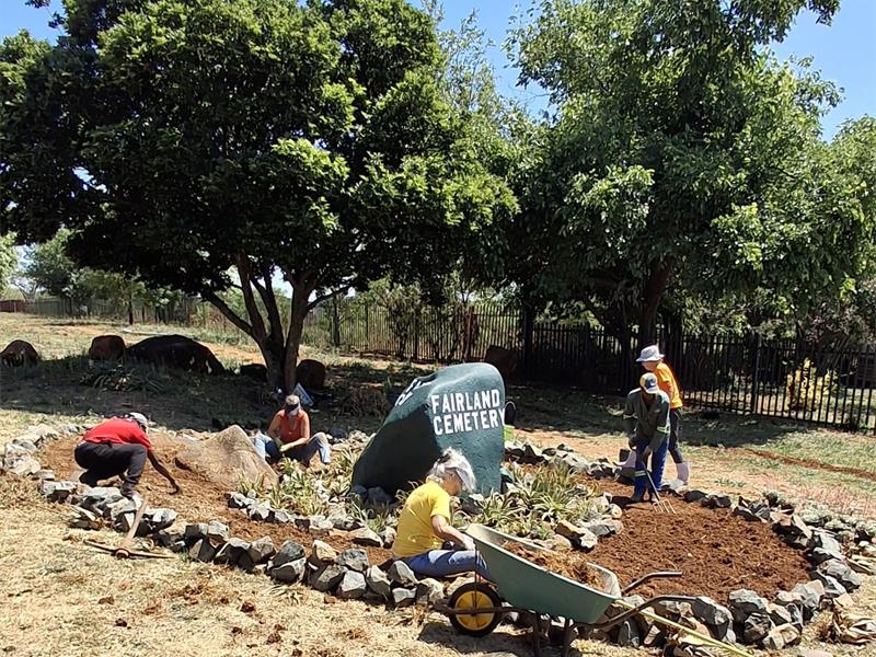 A simple idea sparked by community pride has turned a graffiti-scarred boulder into a beautiful new garden.