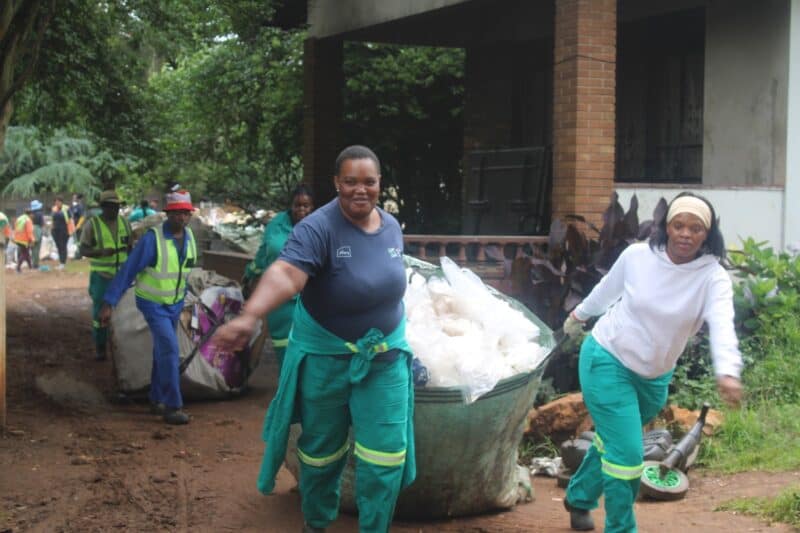 Relocation efforts shift social problems and waste accumulation to nearby communities, prompting municipal intervention and voluntary accommodation offers.