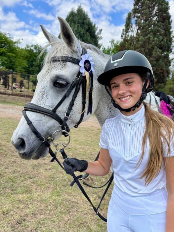 Her journey began with a pony named Champ, and today, she’s preparing for major qualifiers with a mare who mirrors her heart and determination.