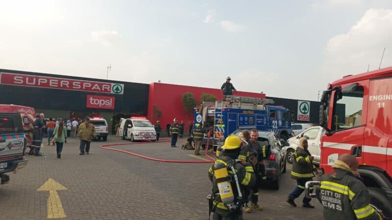 Emergency crews respond after black smoke seen at Super SPAR; store evacuated.
