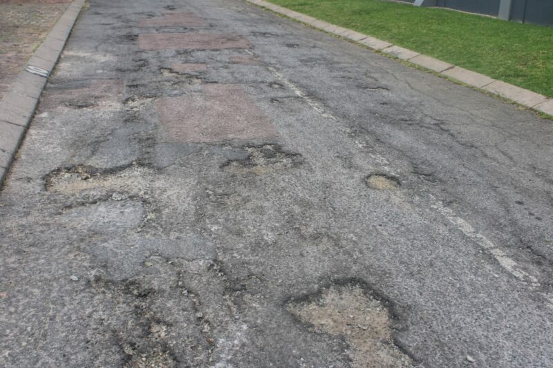 Frustration is growing as JRA defends its strict wayleave process, while civic groups argue red tape is slowing urgent road repairs and blocking community-led solutions.