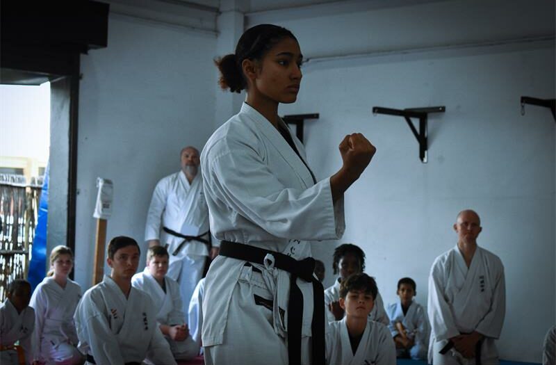 What begins as childhood curiosity at age four grows into a disciplined, demanding journey through belts, setbacks, and breakthroughs inside the dojo.