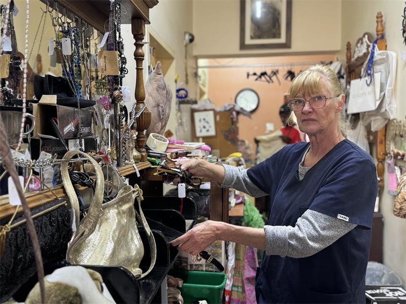 Shoppers come for the bargains but stay for the cats. Meet the woman who built one of the community's most beloved community spaces.