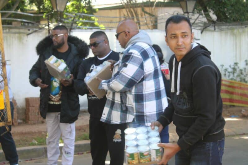 Members of Blanket Drive Jozi handing over the blankets and canned foods to Hotel Hope on June 6, 2026. Photo: Waydon Jacobs