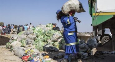 Pikitup employee collects waste. Photo: Supplied